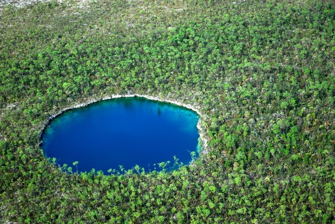 Journey to the hidden waters of the ‘blue holes’ of the Bahamas