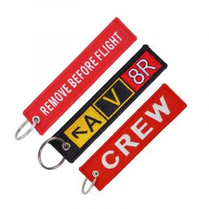 Set of 3 different airplane-themed keychain tags